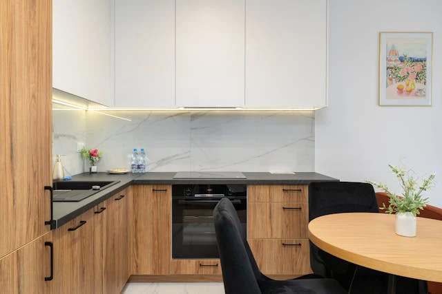 2025 Kitchen Cabinet Design Trends in Singapore: Smart Layouts, Modern Materials & Sustainable Solutions 1 L-shaped layout in modern HDB flat