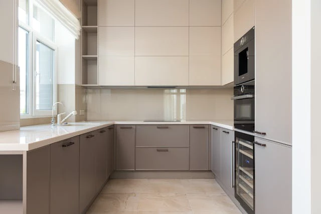 Kitchen Cabinet Design in Singapore: A Complete 2025 Guide to Materials, Layout & Hardware 2 Close-up of aluminium cabinet under sink paired with plywood overhead cabinets