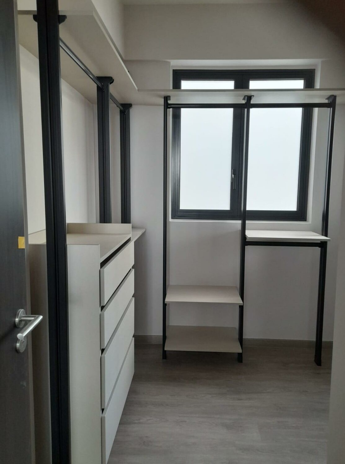 Walk-in wardrobe with window