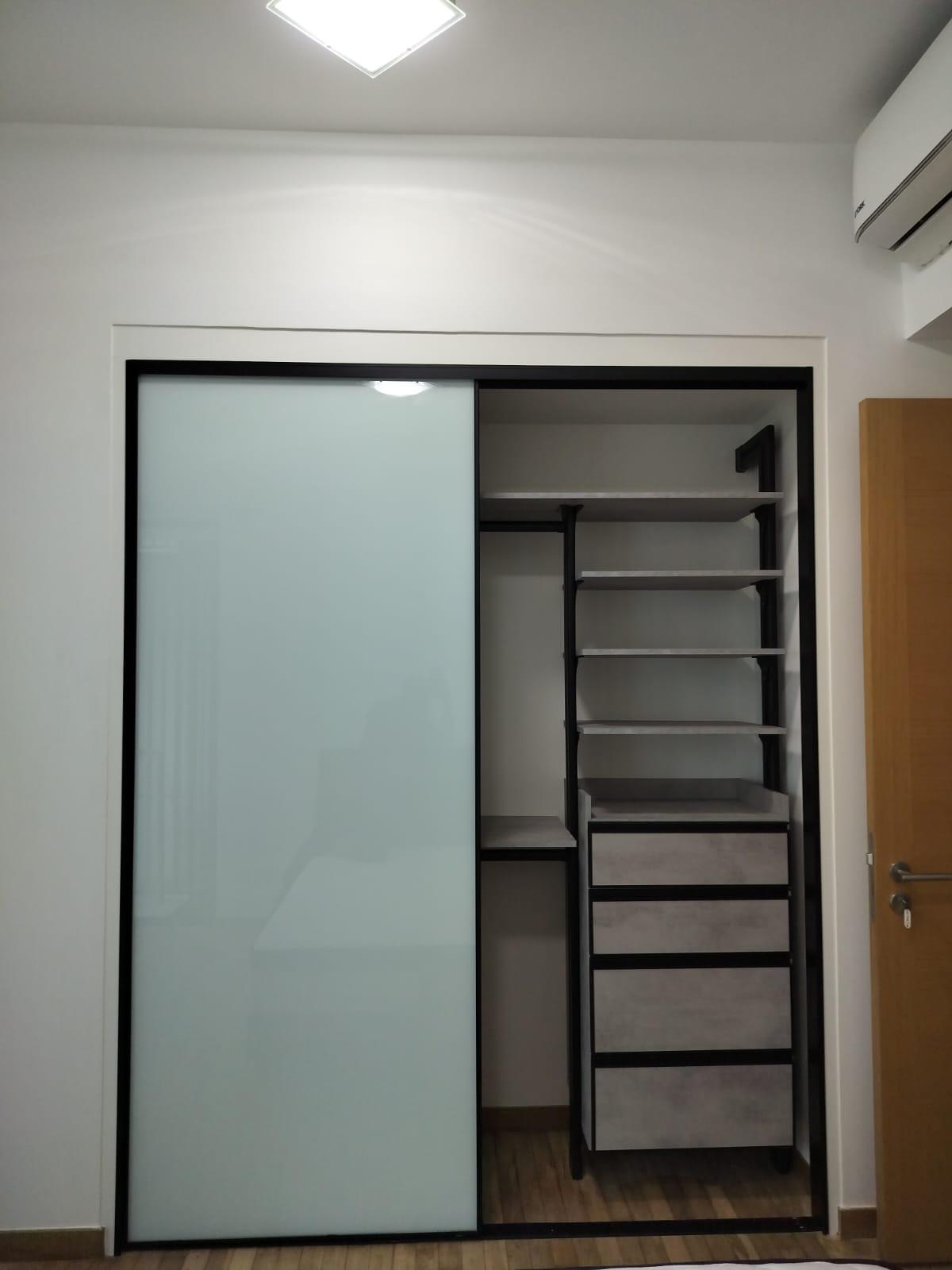 Pole system wardrobe installation in Gambir Walk with storage drawers