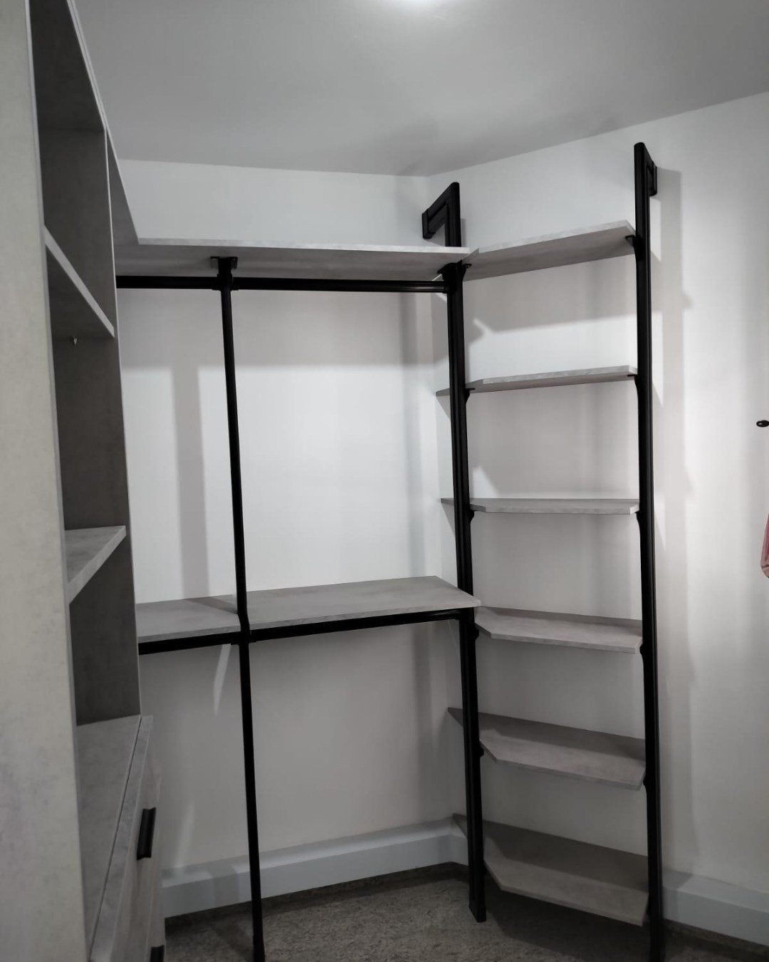 Detail: HausPole drawers and hanging rail section in Yishun slanted wall wardrobe