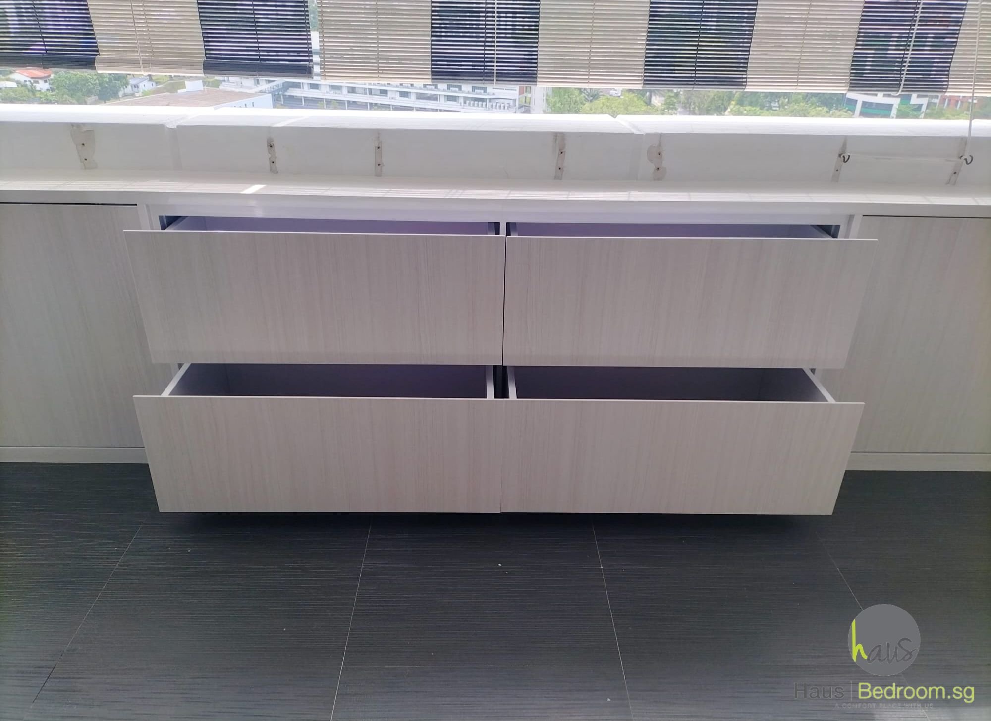 Aluminium carcass balcony cabinet with laminate-finish WPC doors in an Orchard condo