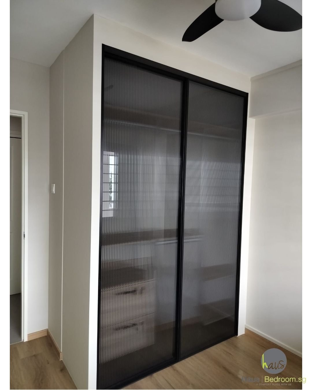 Close-up of fluted glass wardrobe door