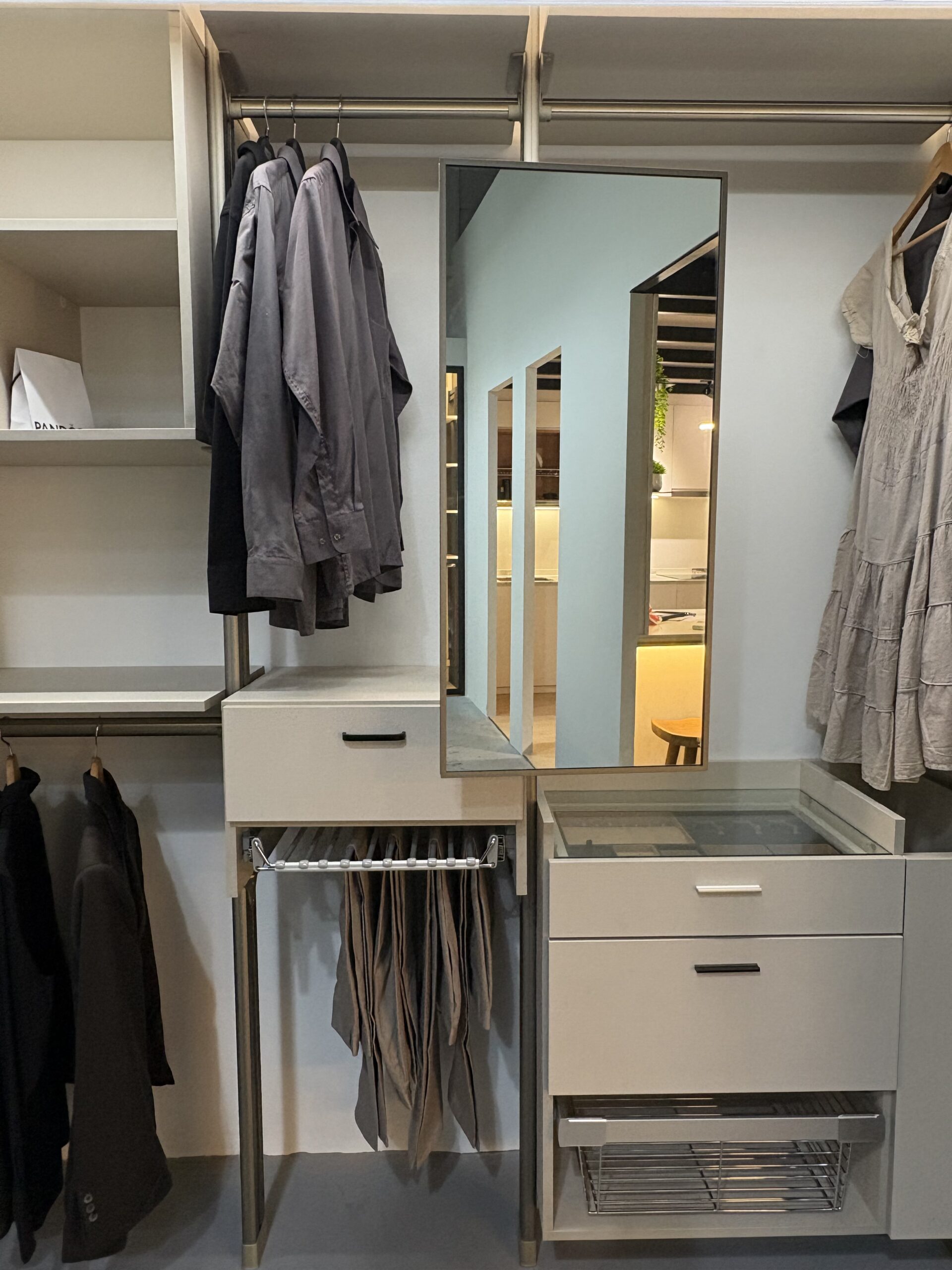 Flip mirror accessory in a HausPole wardrobe