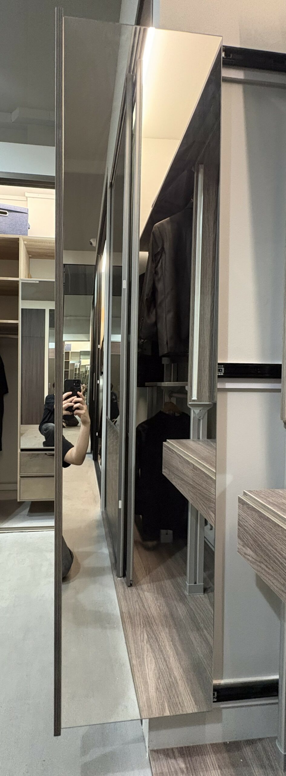 Full-length pull-out mirror in a HausPole wardrobe