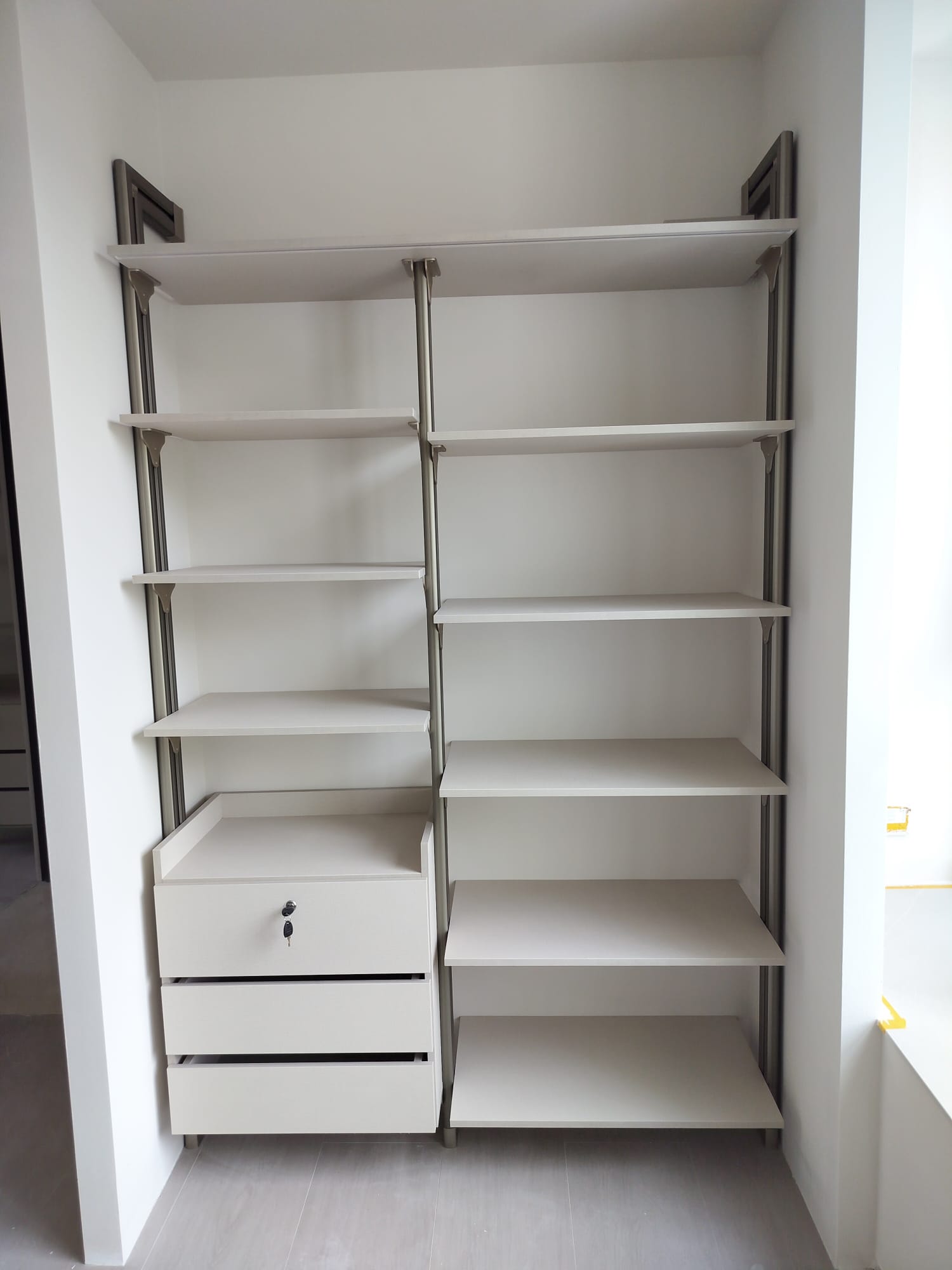 Champagne HausPole pole system wardrobe installed in a bedroom