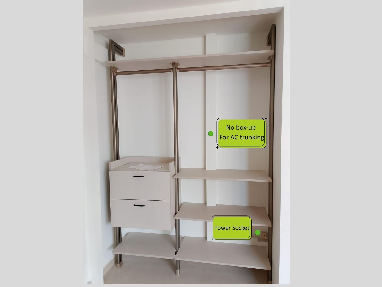 HausPole pole system wardrobe with shelves in front of vertical aircon trunking and a power point left open, not boxed up