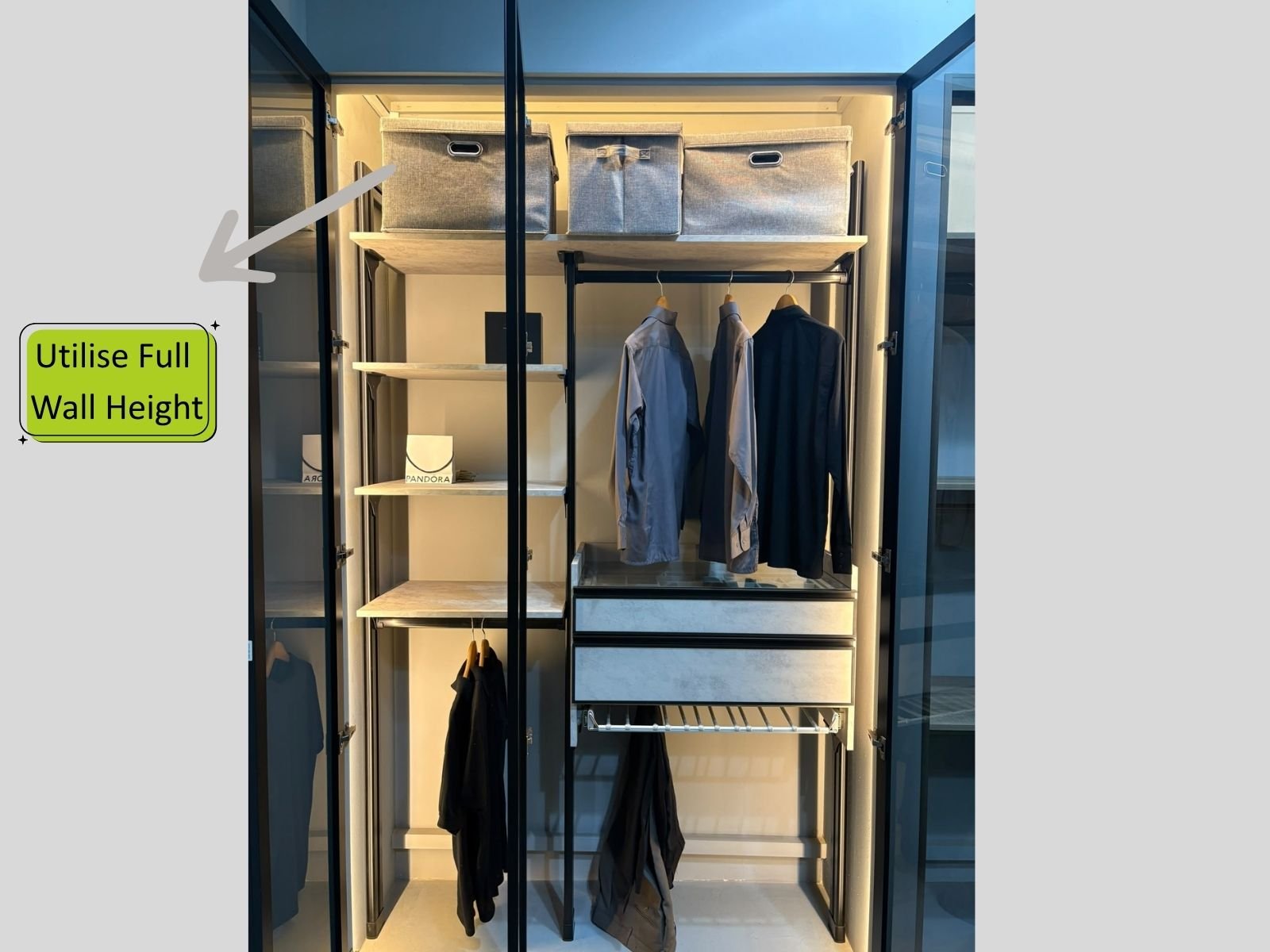 Luggage sliding in at floor level under a HausPole wardrobe with no base board